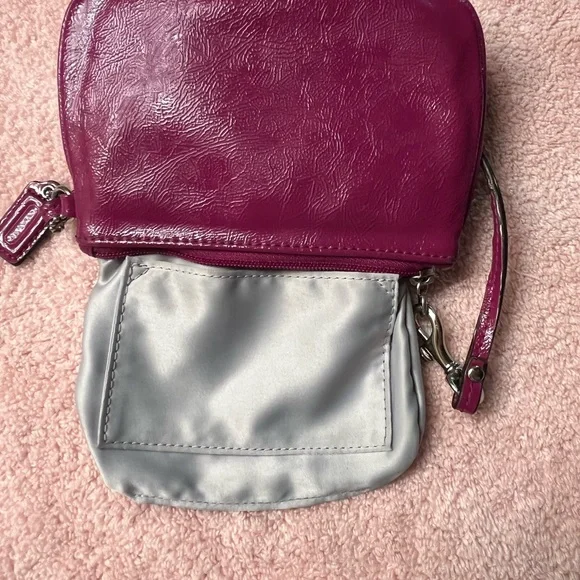Coach
Poppy Plum/Purple Patent Leather Wristlet - Picture 7 of 7